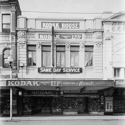 Facade of ornate two storey Kodak House building with Kodak shop on ground level.