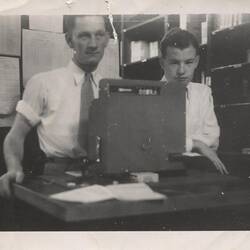 Photograph - Ron Williamson & Junior Sales Assistant at Cash Register, Kodak Store, Collins St, circa 1950s