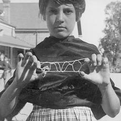 Photograph - Girl Playing 'Bridge' or 'French Lace' String Game, Dorothy Howard Tour, Australia, 1954-1955
