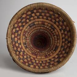 Woven fibre round basket, inside view.