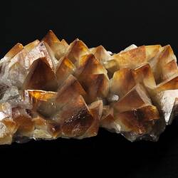 Brown-tipped white crystals.