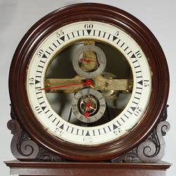 Wooden clock. Detail of clock face.