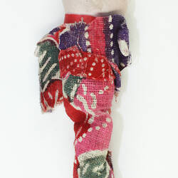 Small Japanese doll in kimono, back side.