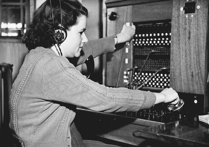SUNSHINE PERSONALITIES - MISS JOAN HOWARD IS ONE OF THE YOUNG LADIES WHO ATTEND THE SWITCHBOARD AT HEAD OFFICE, SUNSHINE: `SUNSHINE REVIEW': SEPT 1949