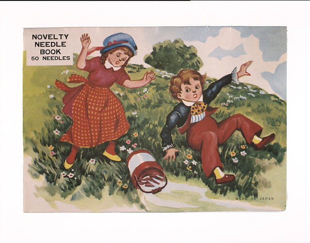 Two children tumbling down a hill.