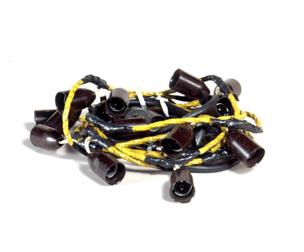 Brown light sockets and yellow and black electrical cords