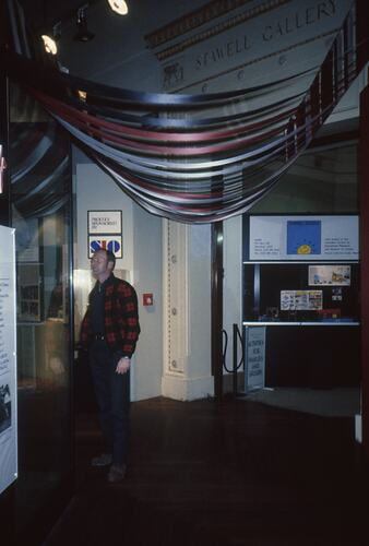 Interior of the museum with showcase in the distance.