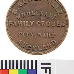 Token - 1 Penny, M. Somerville, Wholesale Family Grocer, Auckland, New Zealand, 1857