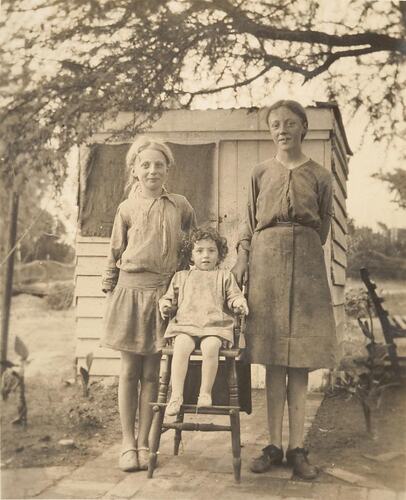Digital Photograph - Three Girls Standing by Garden Shed, Deepdene, 1917
