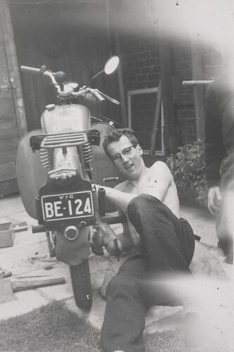 Digital Photograph - Boy Cleaning First Motorbike, Backyard, Flemington, 1956