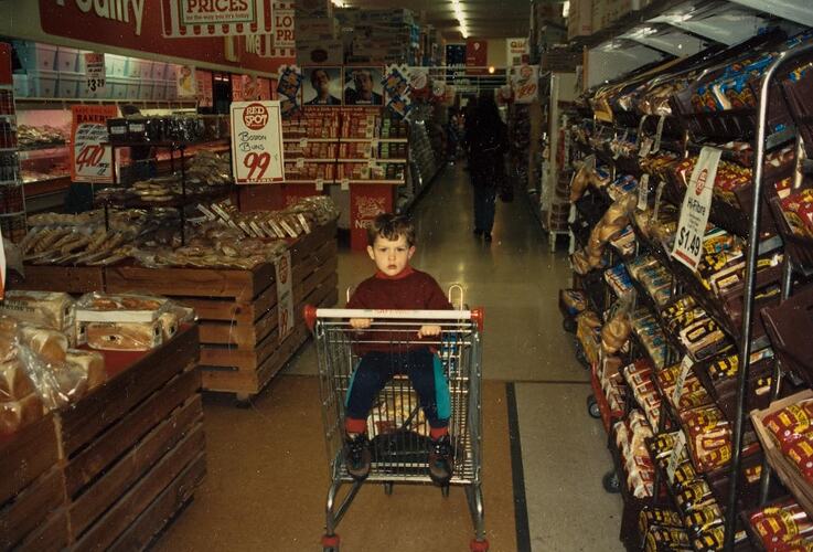 Digital Photograph - Boy in Shopping Trolley in Supermarket, Carrum, 1990s