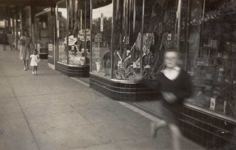 Digital Photograph - Boy Running past Shops, Woman & Girl Walking Behind, Moonee Ponds, 1949