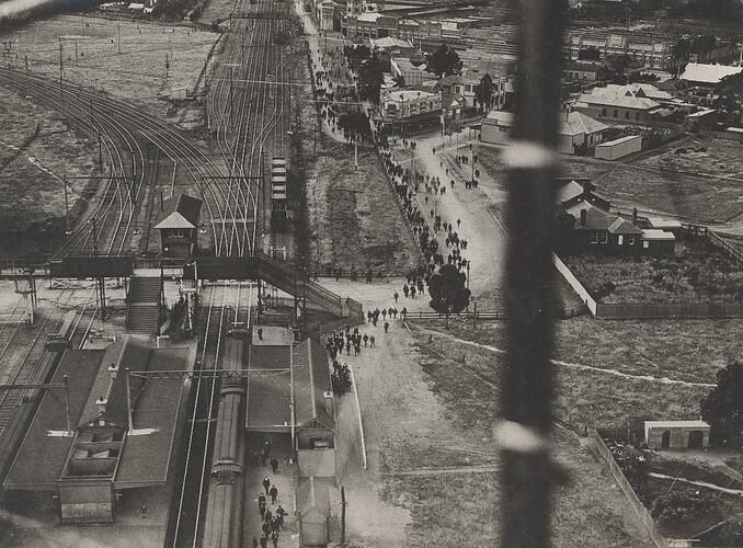 Aerial view of workers leaving the HV McKay Sunshine Harvester Works factory.