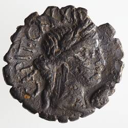 Round coin, aged, female profile, facing right, wearing headdress.
