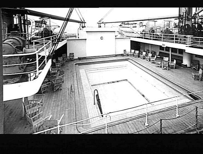 Ship deck with empty rectangular swimming pool.