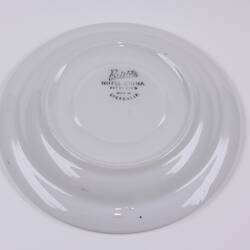 Underside of ceramic plate showing makers mark.