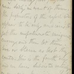 Open diary with handwritten text on discoloured worn page.