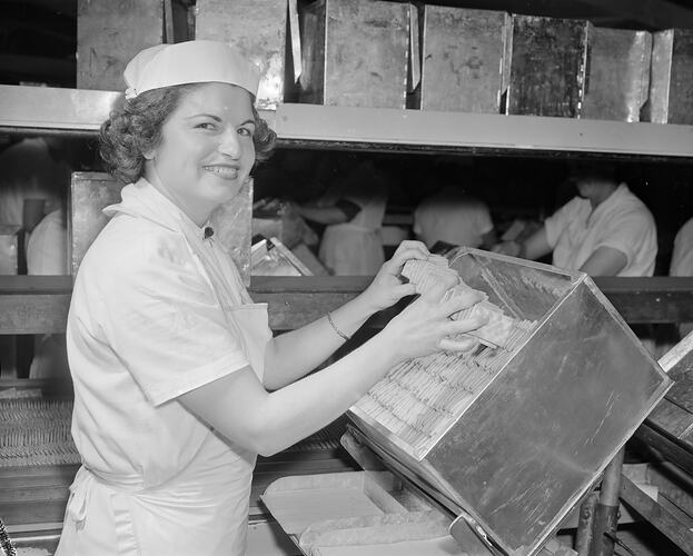Swallow & Ariell Ltd, Woman Packing Biscuits, Port Melbourne, Victoria, 22 Sep 1959