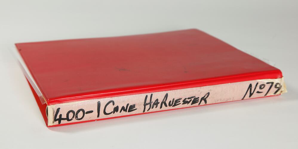 Photograph Album of harvesting equipment.