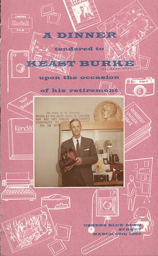 Pink cover with illustrated background and central photograph.