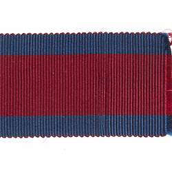 Ribbon with three stripes of red and blue.