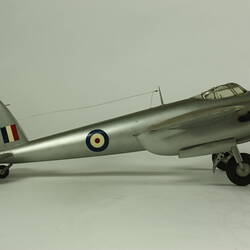 Silver model aeroplane.