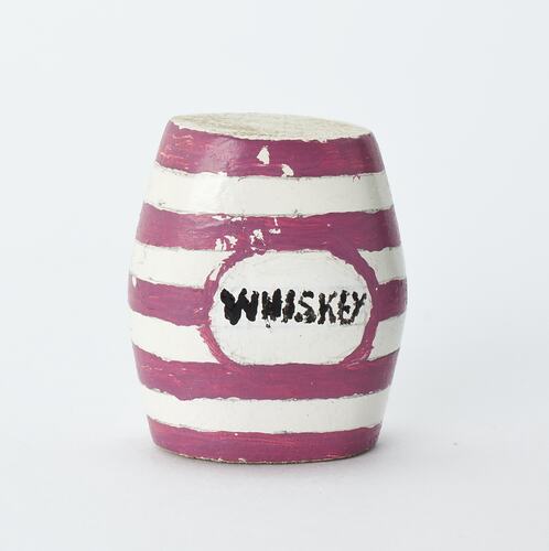 Miniature striped whiskey jar from a doll's house.