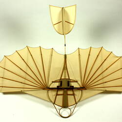 Model of off-white glider. Underside view.