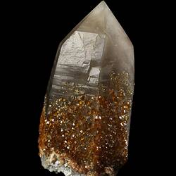 Orange crystals on a larger white prism.