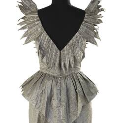 Silver grey dress bodice, reverse. Ruffled fabric along plunging V shape back.