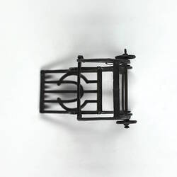 High chair converted to chair and table, front view.