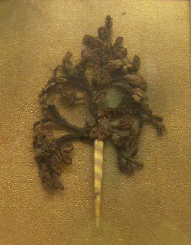 Detail of mourning brooch in form of flowers.