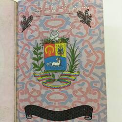 Open passport with colour patterned page bearing coat of arms with unicorn.