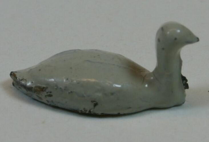 Toy metal white swan.