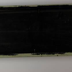 Rectangular black cardboard.