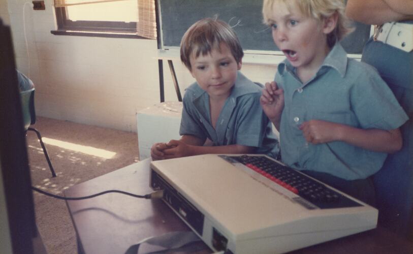 Young person working on a computer.