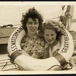 Digital Photograph - Tine Roelie Beatrix Gravemaker & Connie in Life Ring, SS Waterman, 1956