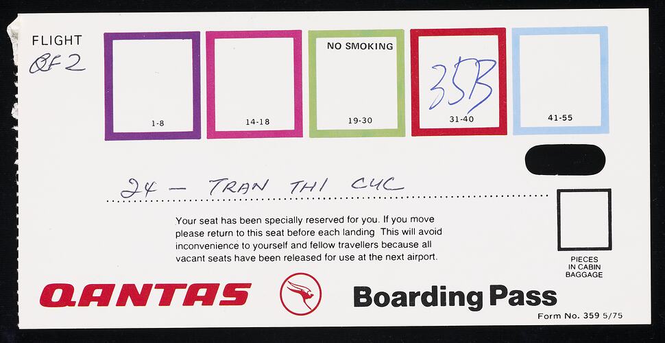 White card with 'Qantas Boarding Pass' printed at bottom and series of 5 coloured squares across the top.