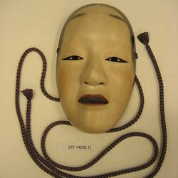 Wooden mask and rope