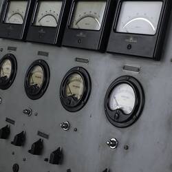 Detail of computer console, gauges, switches.