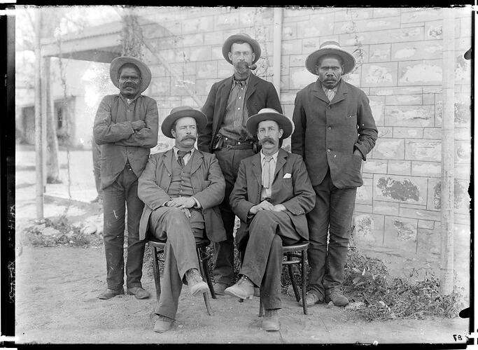 Purunda (Warwick),  Chance,  Erlikiliakirra (Jim Kite), Frank Gillen, and Baldwin Spencer, members of the 1901-1902 Expedition, Alice Springs, Central Australia, 18 May 1901.