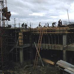 Slide - Kodak Australasia Pty Ltd,  View of Construction of Front Elevation of Building with Workers, Kodak Factory, Coburg, 1958