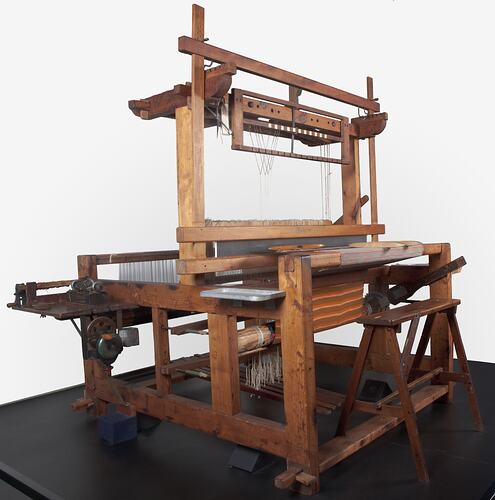 Countermarch floor loom made of recycled timber. Loom is fitted together with wooden pegs and steel bolts, no nails.