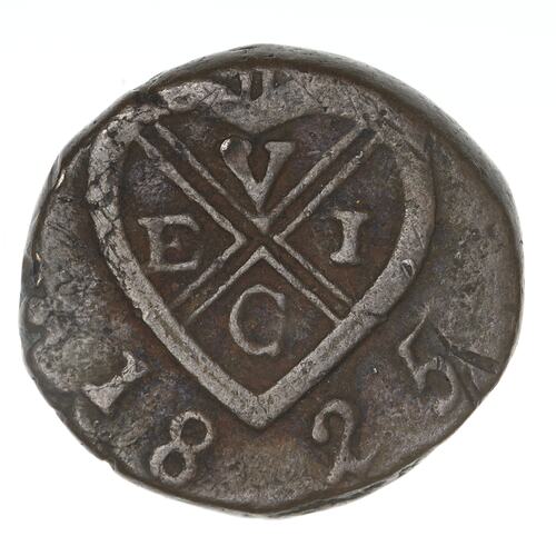 Irregular round tarnished silver coin.