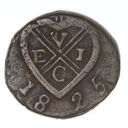 Irregular round tarnished silver coin.