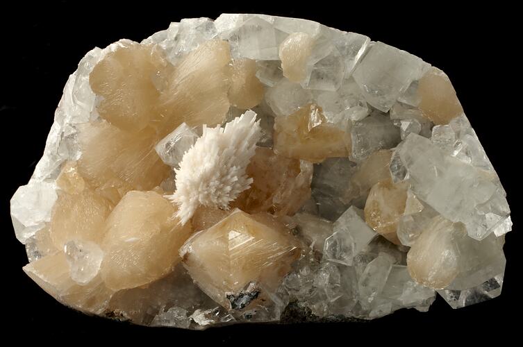 Cream crystal spray on blockier pale crystals.