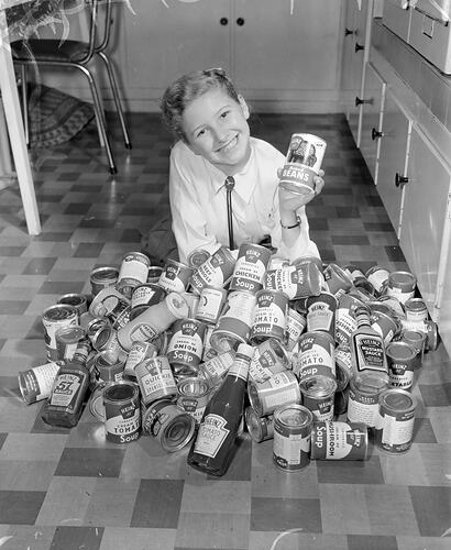 H. J. Heinz Co Pty Ltd, Child with Packaged Food Products, Melbourne, Victoria, Jul 1957