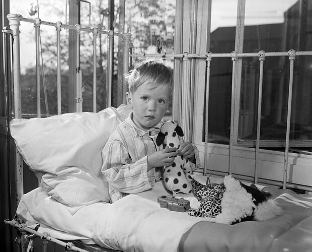 Royal Children's Hospital, Boy Holding Toy, Carlton, Victoria, 11 May 1959