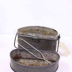 Metal tin with lid.