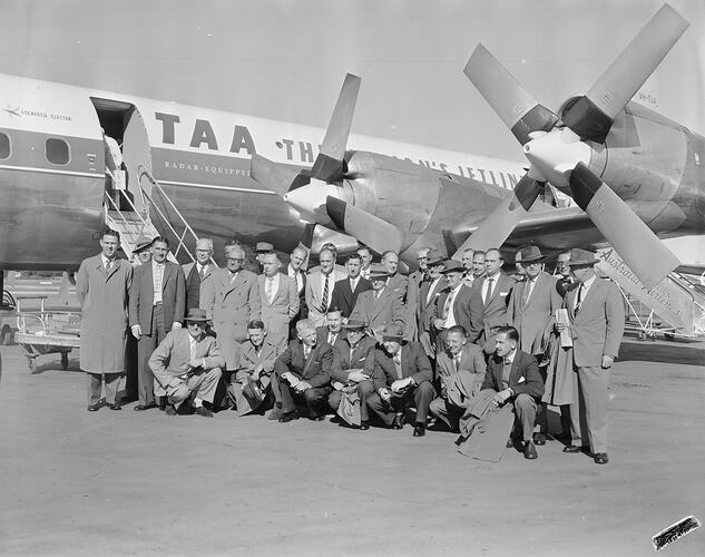 Group of Men with an Aeroplane, Trans Australia Airlines, Essendon Airport, Victoria, 17 Sep 1959